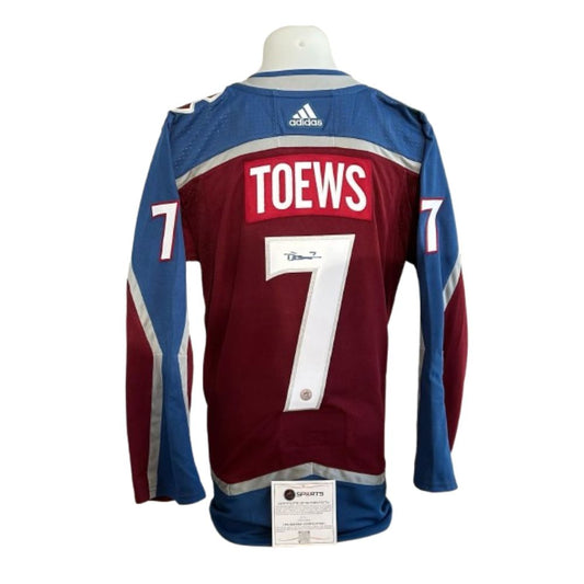 Official Adidas signed jersey - Devon Toews home AJs coa